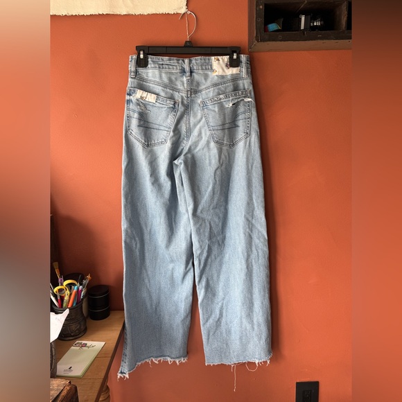 American Eagle Outfitters Light Wash Straight-Leg Jeans with Blue Floral Patches - Picture 3 of 6